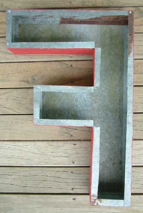 ex shop or business large painted galvanised iron letter F